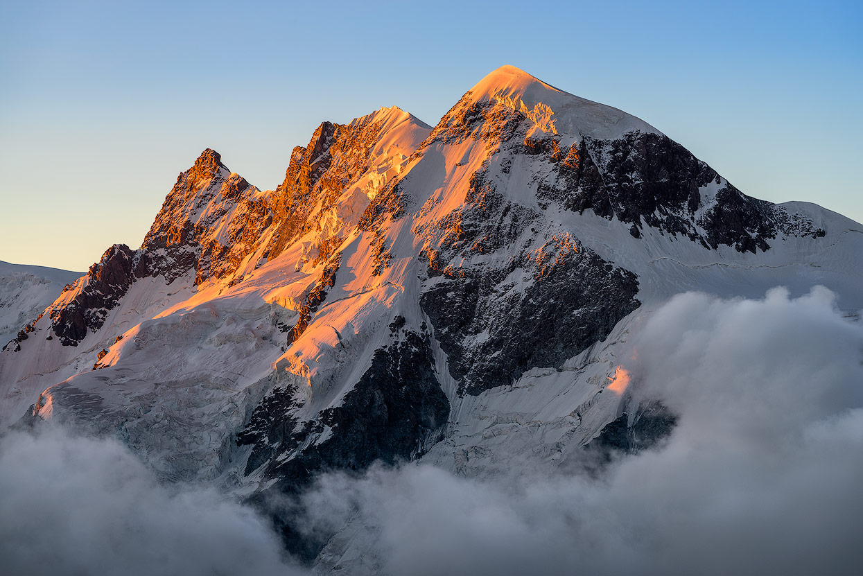 Moody Sunset on mount Breithorn. This shot has been taken from the Hörnlihütte with a zoom lens